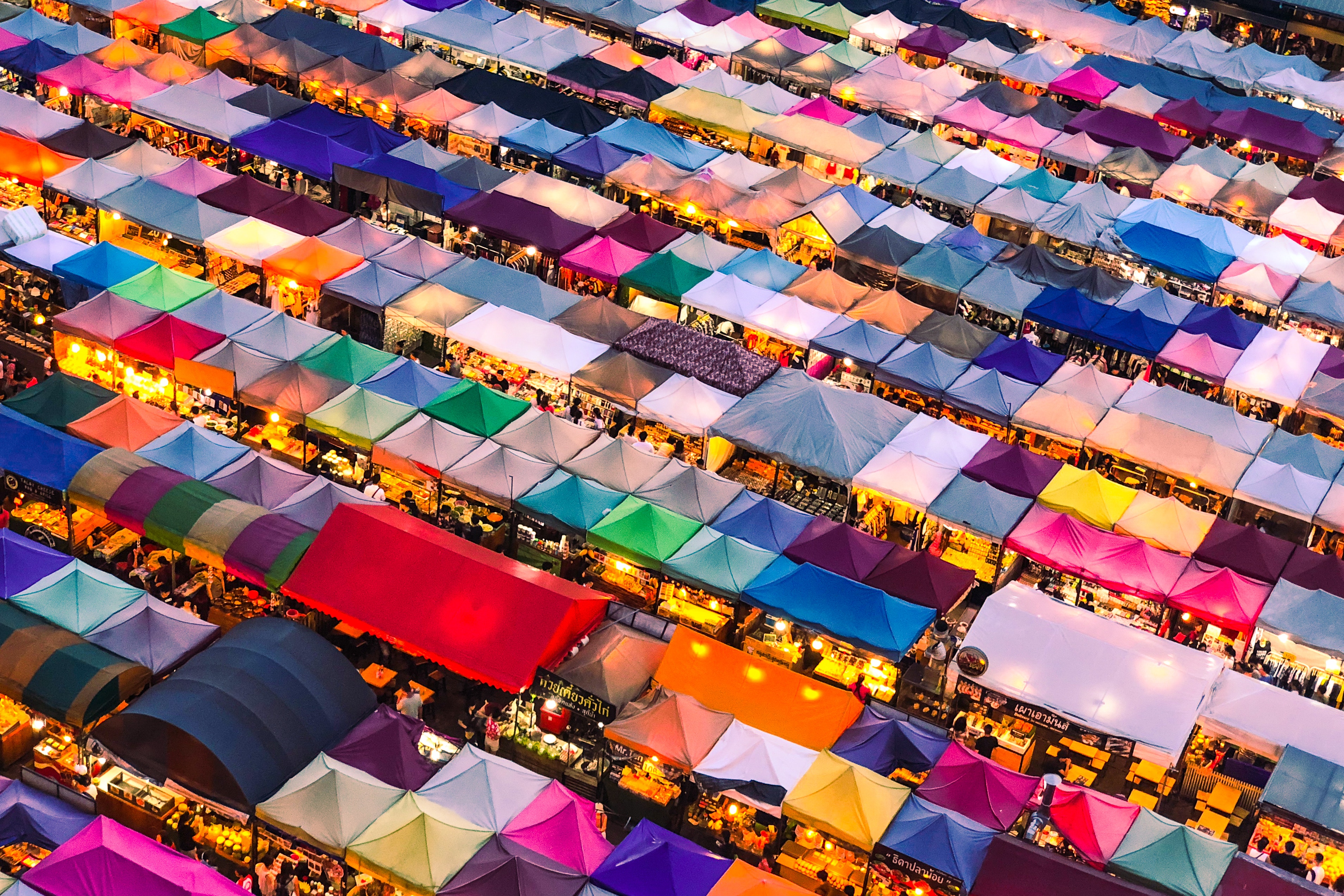 Aerial view of colourful tentage at Rachada Rot Fai Train Night Market in Bangkok 